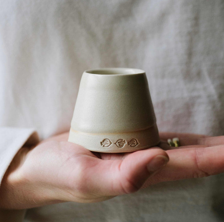 EOT handmade de-bossed egg cup - bird